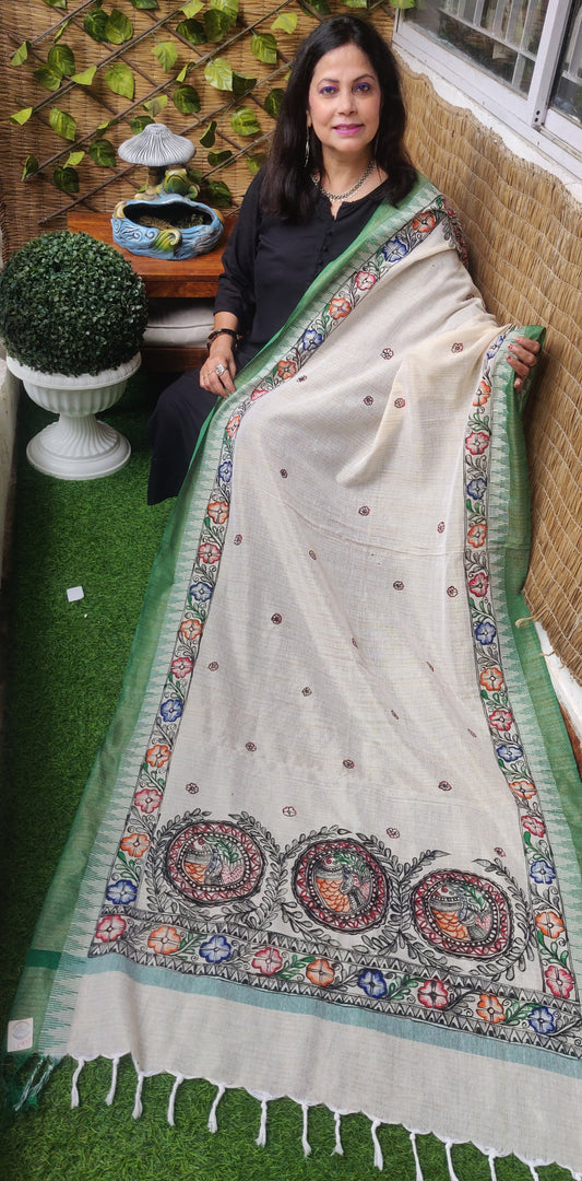 Handpainted madhubani art flower and fish motifs on cream cotton dupatta with green border