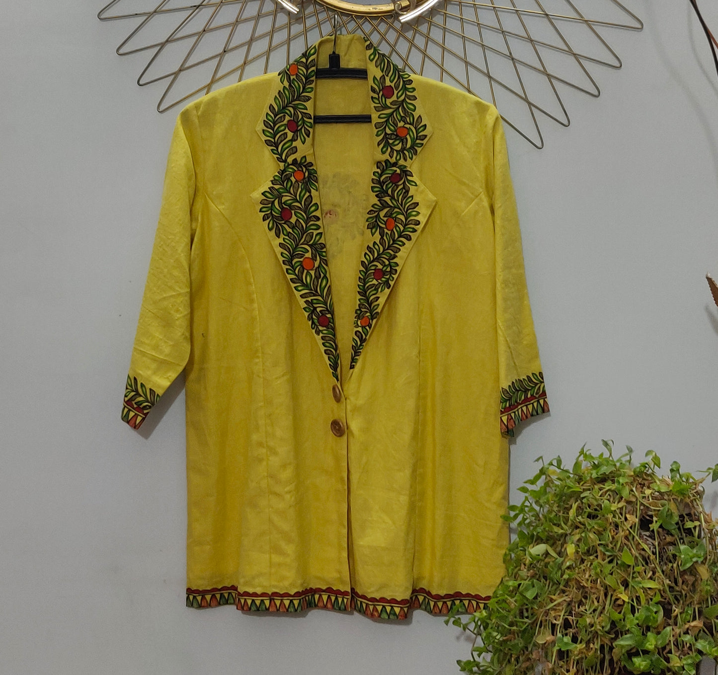 Handpainted madhubani motifs on collar and border of yellow pure cotton short trench coat