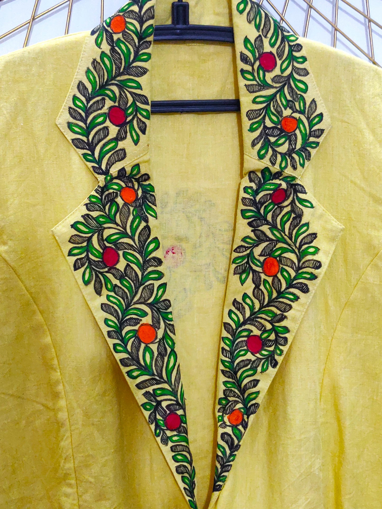 Handpainted madhubani motifs on collar and border of yellow pure cotton short trench coat